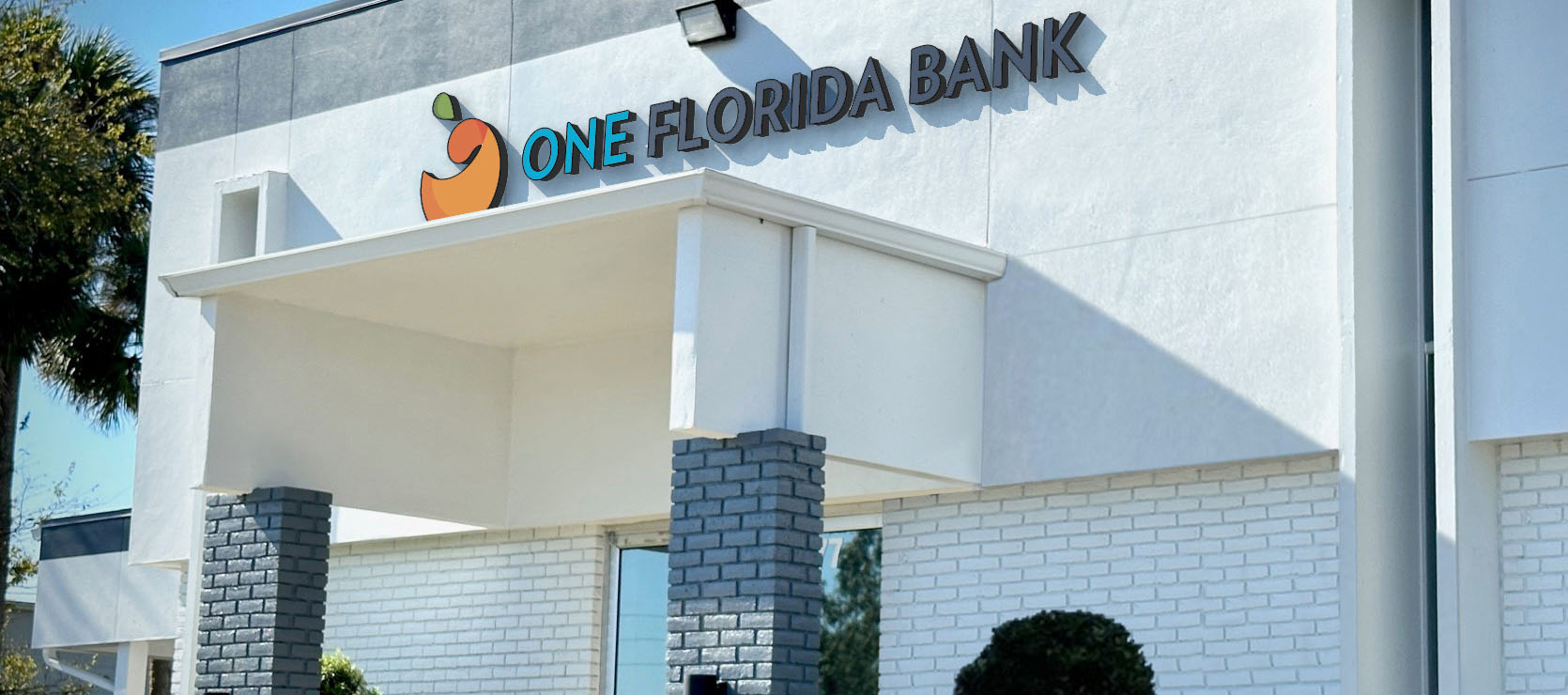 Partial picture of the front of the One Florida Bank Oviedo branch